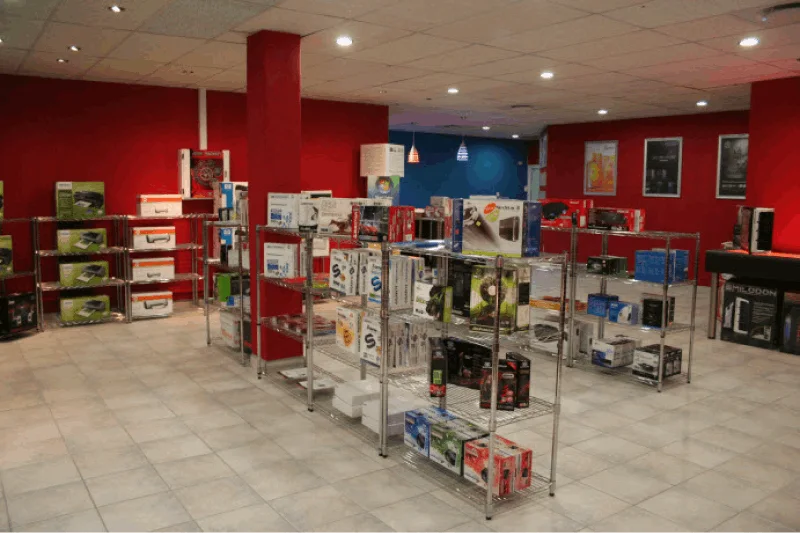 The shop floor, with shelves of computer components and accessories