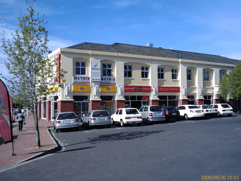 The shopping centre building with Matrix Computers signage, photographed in September 2009